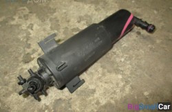 Форсунка омывателя фар прав. (61 Общее э/оборудование автомобиля) 7173852